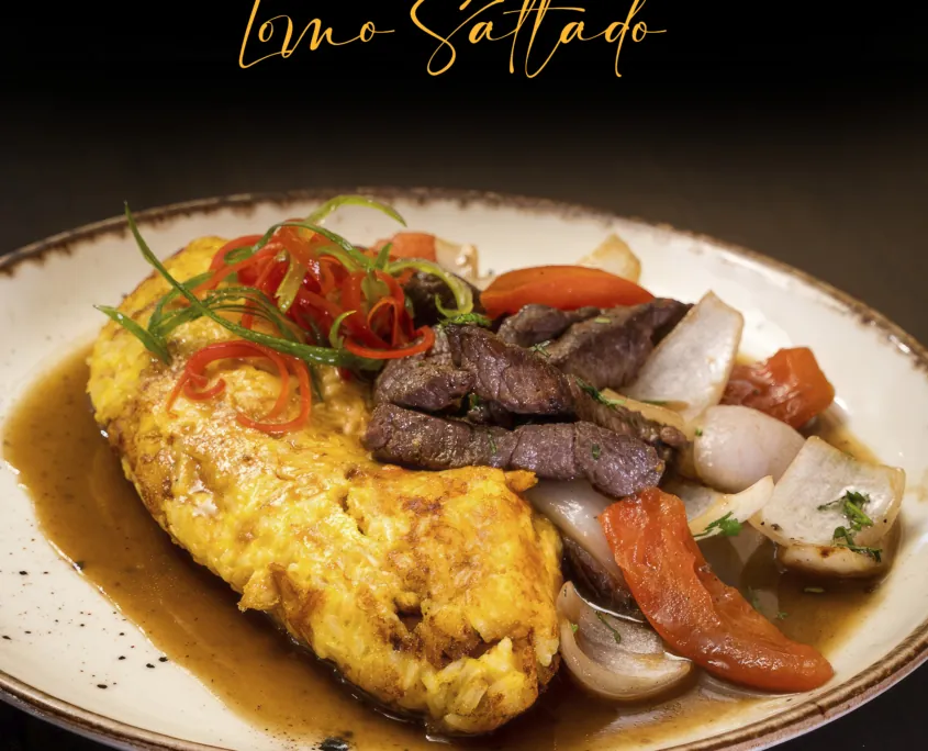 Tacu tacu de ají de gallina con lomo saltado